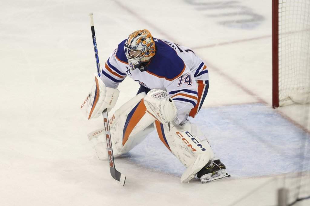 Edmonton Oilers' Stuart Skinner defends the goal during the third period of an NHL hockey game against the New York Rangers Sunday, March 16, 2025, in New York.
