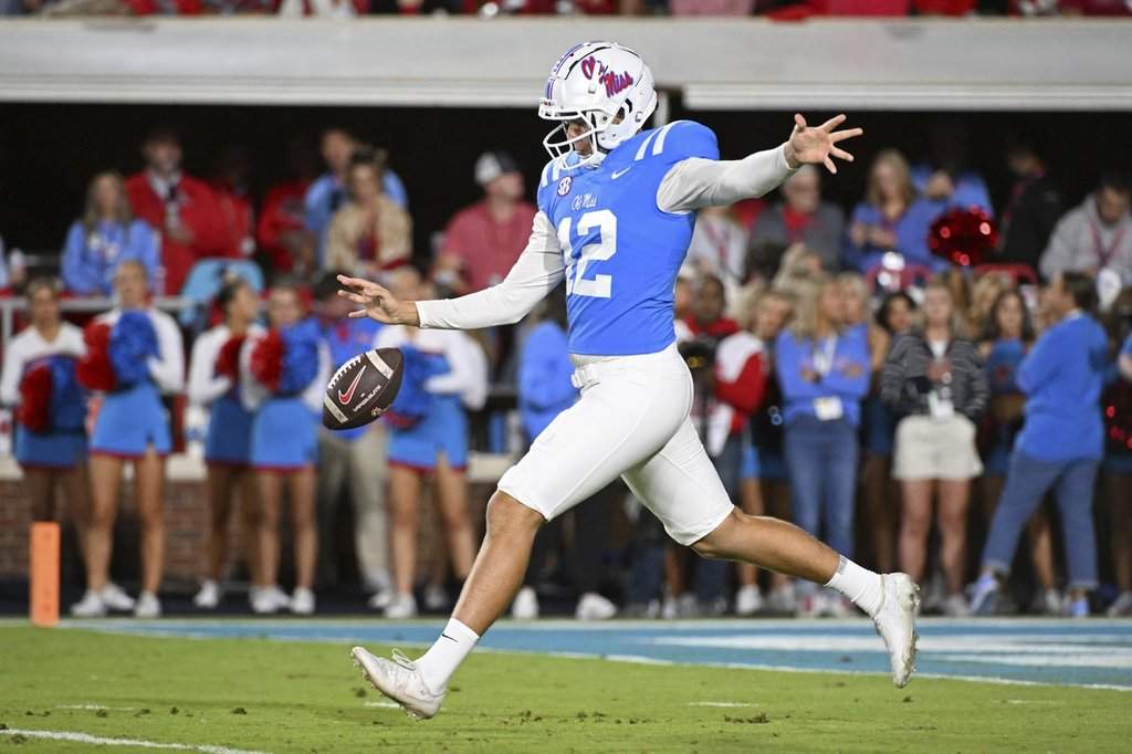 Mississippi punter Fraser Masin punts the ball during the first half of an NCAA college football game against Arkansas in Oxford, Miss., Saturday, Oct. 7, 2023.