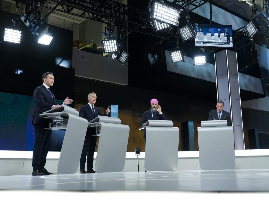 Conservative Leader Pierre Poilievre, left to right, Liberal Leader Mark Carney, New Democratic Party Leader Jagmeet Singh and Bloc Québécois Leader Yves-Francois Blanchet at English-language leaders’ debate in Montreal, April 17, 2025.