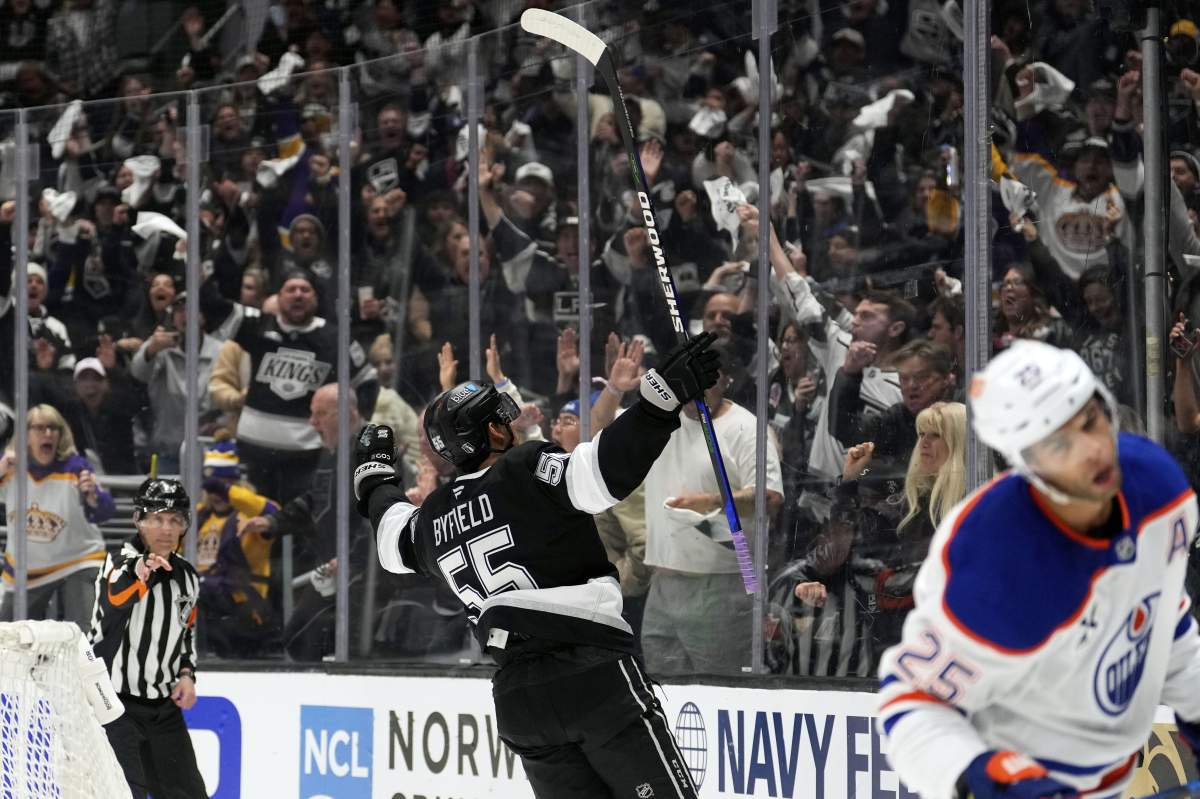 Los Angeles Kings right wing Quinton Byfield celebrates his goal as Edmonton Oilers defenceman Darnell Nurse skates away during the second period in Game 2 of an NHL hockey first-round playoff series Wednesday, April 23, 2025, in Los Angeles.