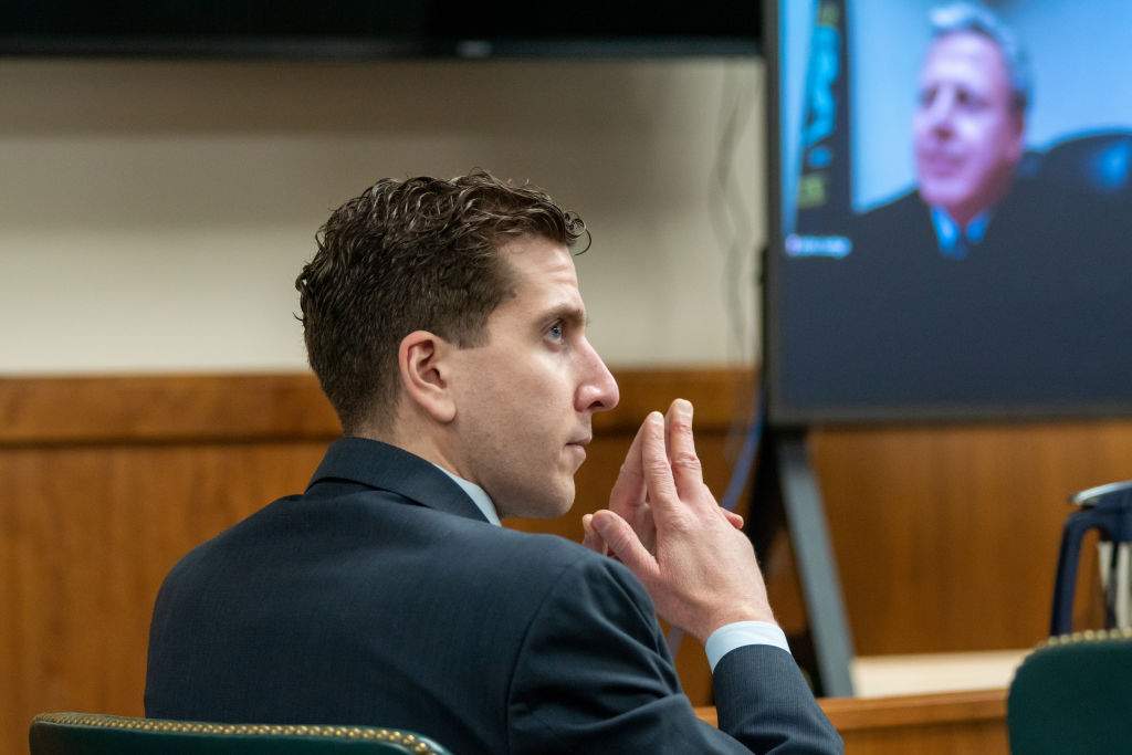 Bryan Kohberger listens to arguments during a hearing to overturn his grand jury indictment on October 26, 2023 in Moscow, Idaho. Kohberger, a former criminology PhD student, was indicted earlier this year in the November 2022 killings of Madison Mogen, 21; Kaylee Goncalves, 21; Xana Kernodle, 20; and Ethan Chapin, 20, in an off-campus apartment near the University of Idaho.