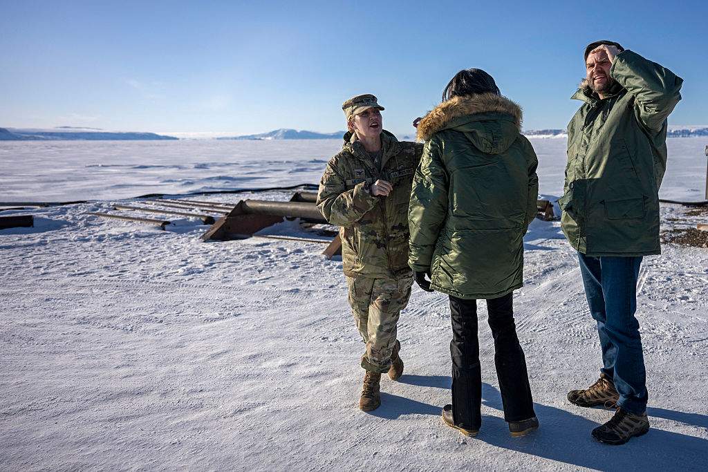 US Vice President JD Vance (R) and second lady Usha Vance (C) with Col Susannah Meyers, tour the U.S. military's Pituffik Space Base on March 28, 2025 in Pituffik, Greenland.