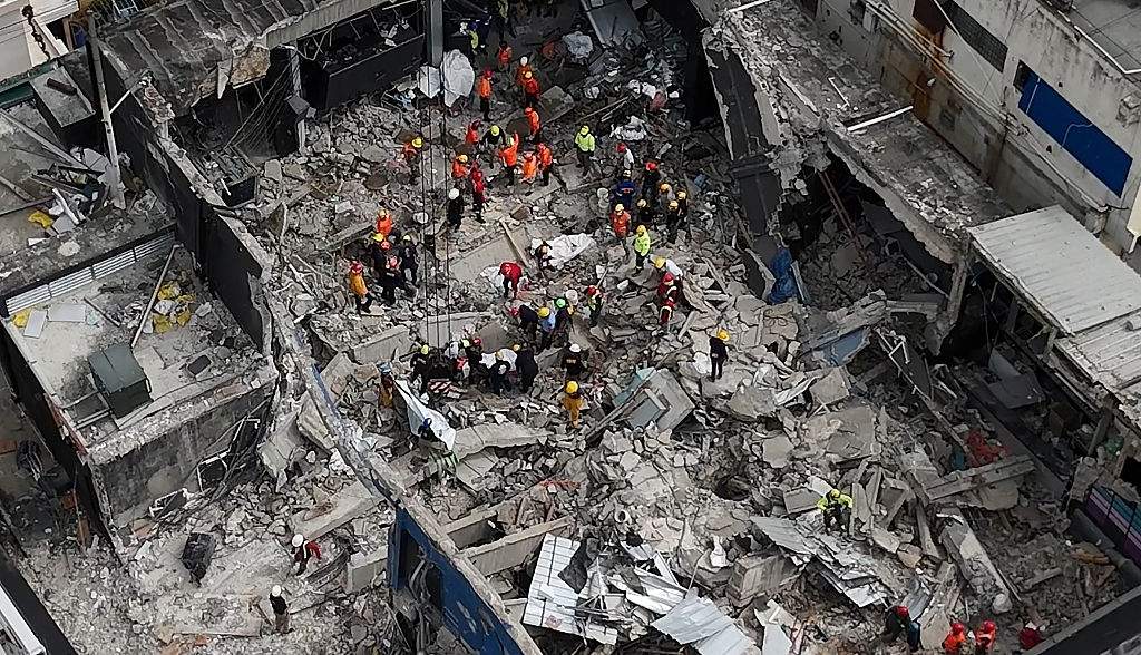 Aerial view shows rescue teams working at the Jet Set nightclub a day after the collapse of its roof in Santo Domingo on April 9, 2025.
