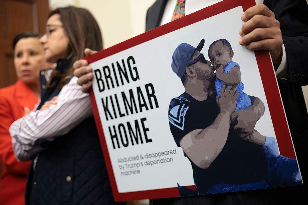 A member of the Congressional Hispanic Caucus holds a picture of Kilmar Abrego Garcia during a news conference to discuss Abrego Garcia's arrest and deportation d at Cannon House Office Building on April 9, 2025 in Washington, DC. The Congressional Hispanic Caucus held a news conference to discuss the deportation of Maryland resident Kilmar Abrego Garcia to the maximum security prison Terrorism Confinement Center (CECOT) in El Salvador, an incident the Trump administration claims as “an administrative error,” but refuses to bring Abrego Garcia back to the United States.