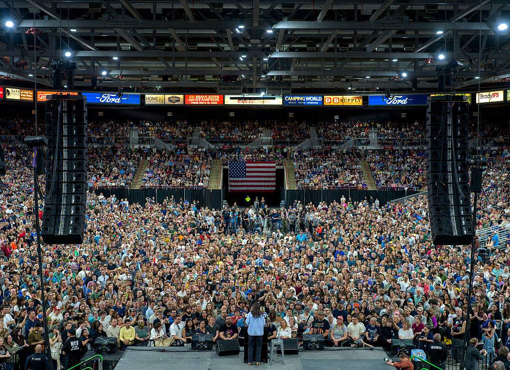 U.S. Rep. Alexandria Ocasio-Cortez (D-NY) speaks to a full auditorium as part of the “Fighting Oligarchy” tour on April 14, 2025 in Nampa, Idaho. According to event organizers, 12,500 people attended the rally.