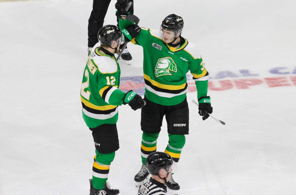 Sam Dickinson and Kasper Halttunen of the London Knights celebrate a goal in Game 1 of the OHL's Western Conference Champinship series.