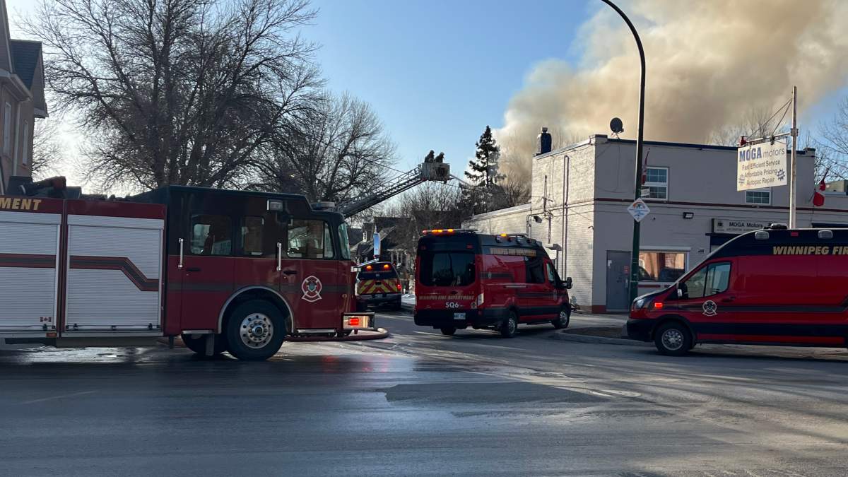 Fire crews at the scene of a blaze on Magnus Avenue Monday morning.