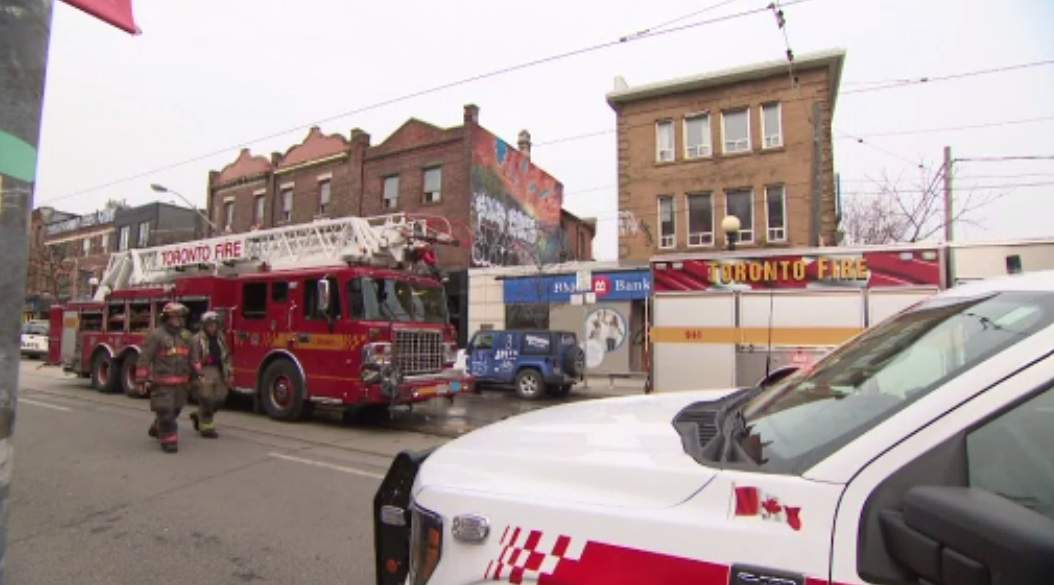 Toronto Fire at the scene of a fatal fire on College Street on April 10, 2025.