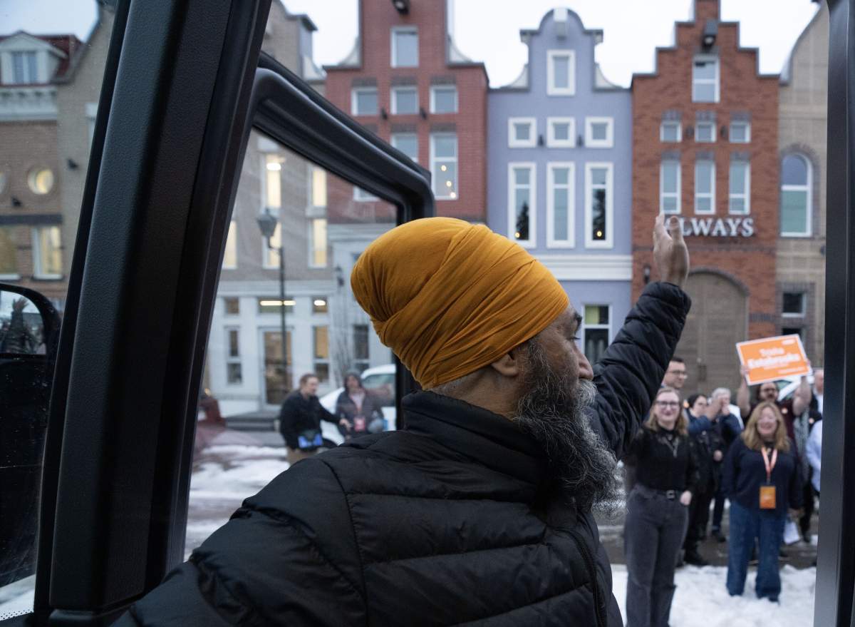 NDP Leader Jagmeet Singh waves to supporters following a federal election campaign stop in Edmonton on Monday, March 31, 2025.