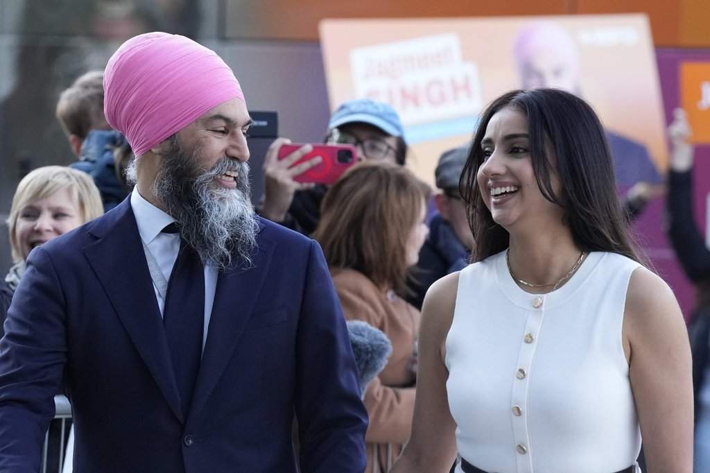 NDP Leader Jagmeet Singh arrives with his wife Gurkiran Kaur Sidhu, for the English-language federal election debate, in Montreal, on Thursday, April 17, 2025.