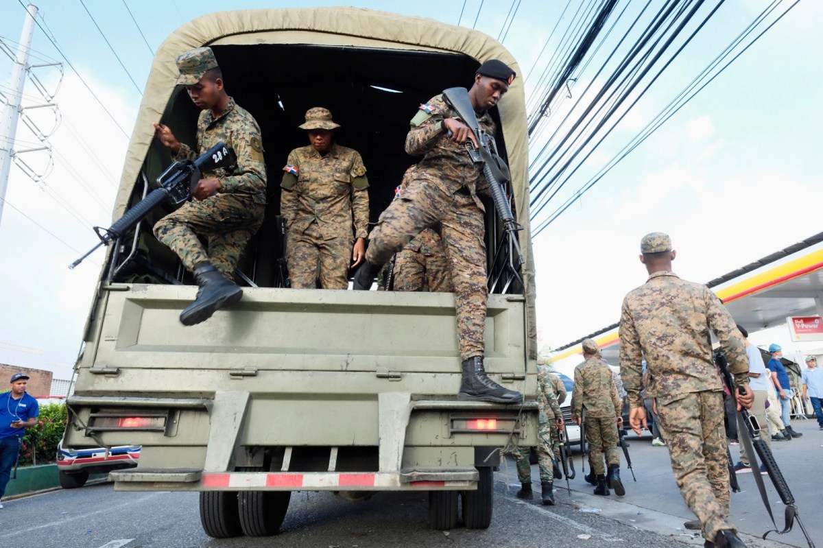Soldiers arrive to the area where rescue workers search for survivors at the Jet Set nightclub after its roof collapsed two nights prior during a merengue concert in Santo Domingo, Dominican Republic, Wednesday, April 9, 2025.