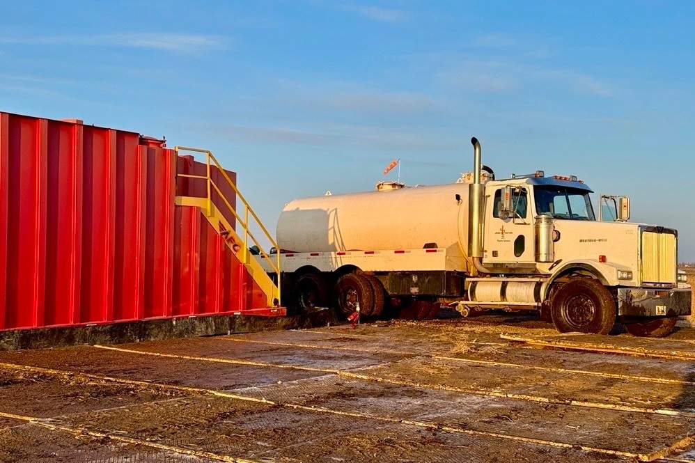 In this photo provided by South Bow, a vacuum truck transfers oil into a storage tank at the scene of a spill of the Keystone oil pipeline that occurred Tuesday, April 8, 2025, near Fort Ransom, N.D.