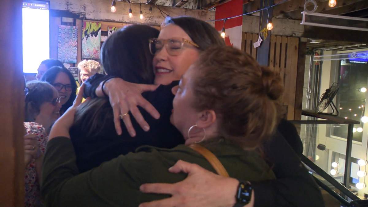 One City's Lucy Mahoney celebrates her victory with supporters in one of two civic byelections in Vancouver on Saturday.
