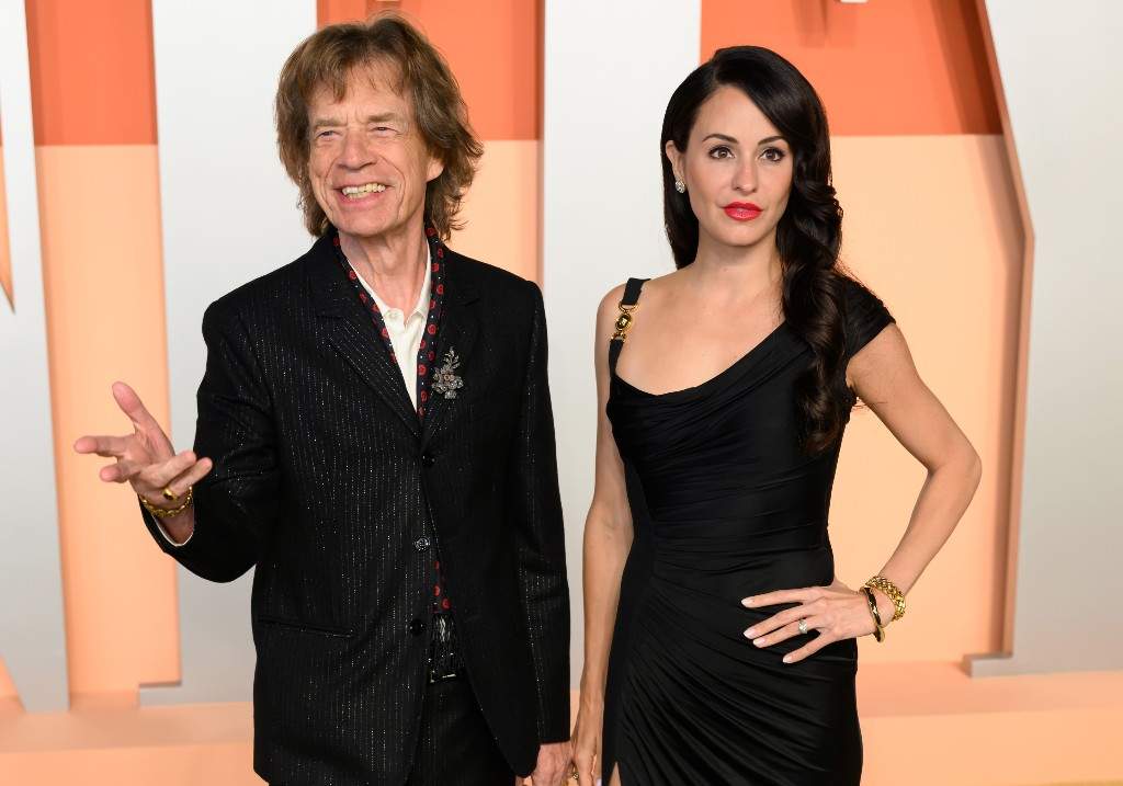 Mick Jagger and Melanie Hamrick attend the Vanity Fair Oscar Party hosted by Radhika Jones at the Wallis Annenberg Center for the Performing Arts on March 02, 2025 in Beverly Hills, California.
