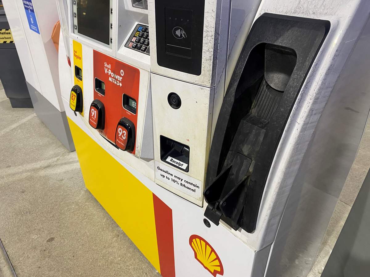 A gas pump is out of service after a man drove off with the nozzle still attached, critically injuring another man.