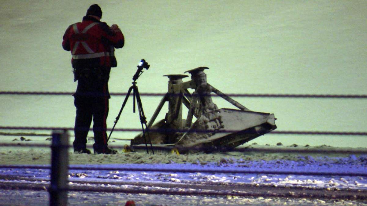 Following the crash, investigators could be seen examining what police later said appeared to be a piece of the semi truck left behind at the crash scene.