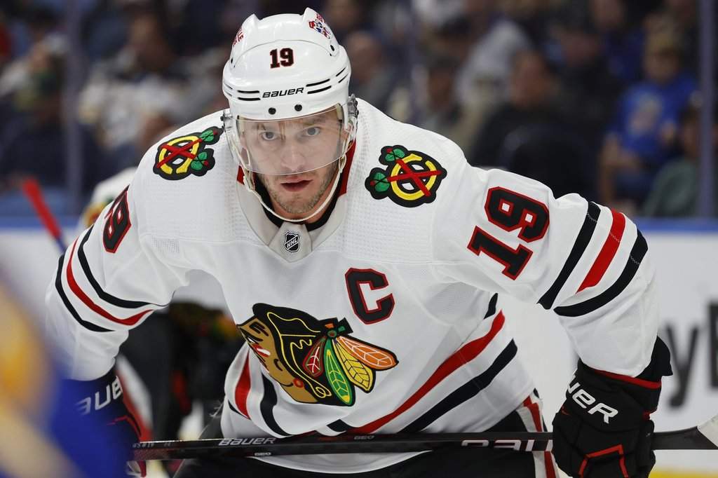 FILE - Chicago Blackhawks center Jonathan Toews (19) lines up for a face off during the first period of an NHL hockey game against the Buffalo Sabres, Saturday, Oct. 29, 2022, in Buffalo, N.Y. (AP Photo/Jeffrey T. Barnes, File).