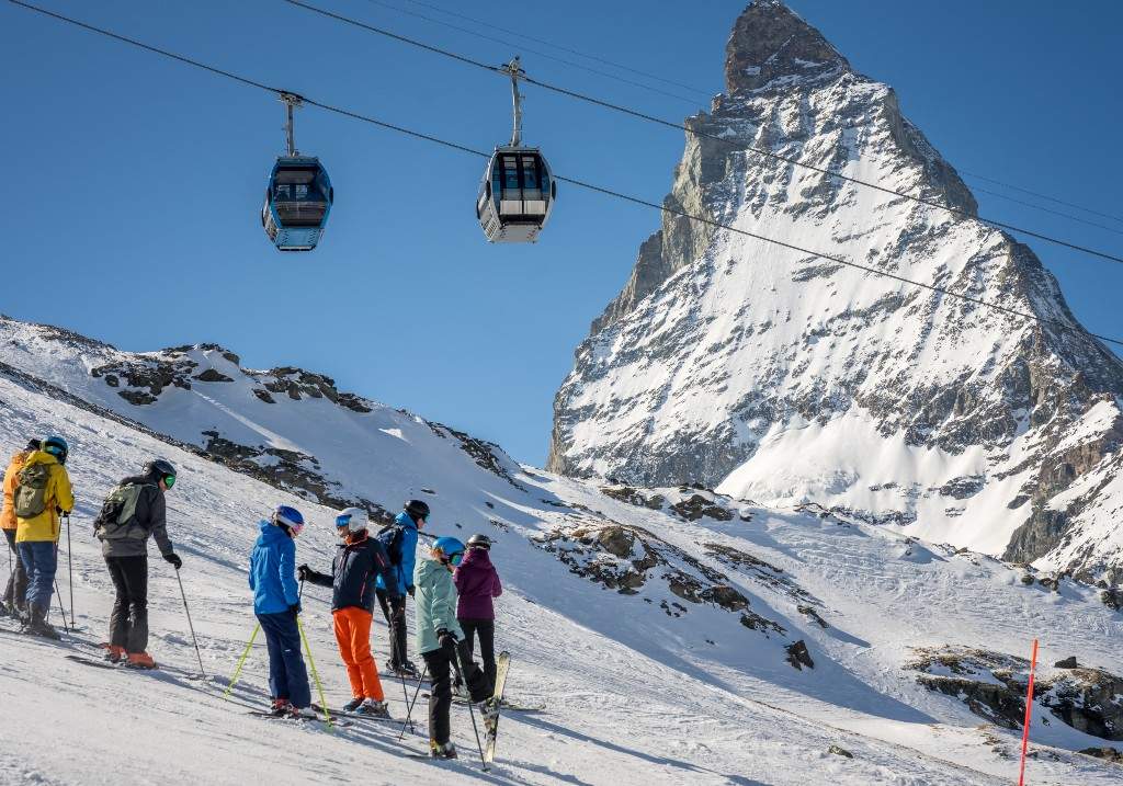 A file photo above the resort of Zermatt shows skiers and gondolas next to the Matterhorn, in the Swiss Alps.