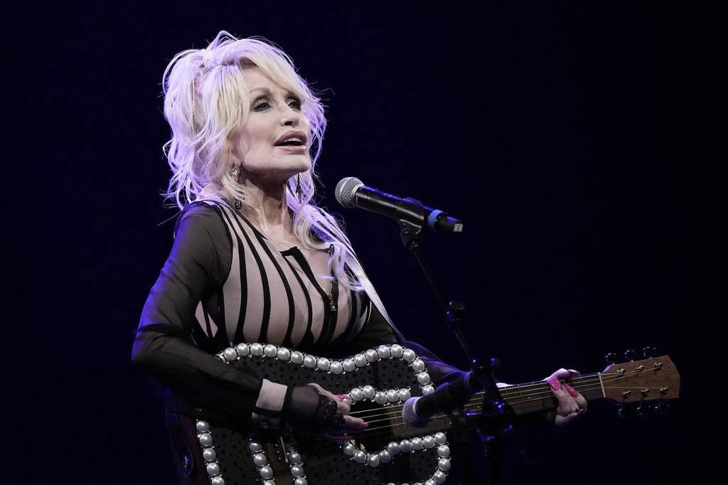 Dolly Parton performs during an event celebrating the expansion of Dolly Parton's Imagination Library Monday, Aug. 14, 2023, in Overland Park, Kan.