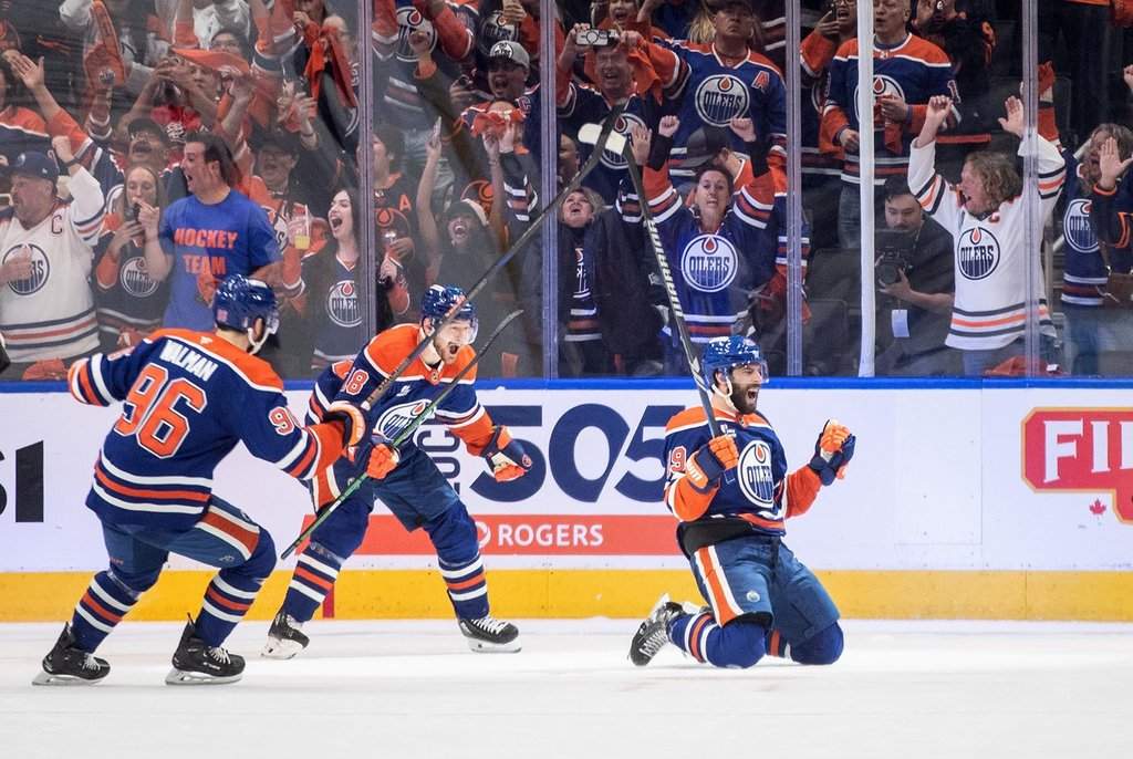 Edmonton Oilers’ Adam Henrique (19), Jake Walman (96) and Zach Hyman (18) celebrate a goal against the Vegas Golden Knights during first period round 2, game 4 NHL Stanley Cup playoff action in Edmonton, Monday, May 12, 2025.