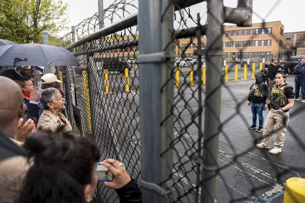 Rep. Bonnie Watson Coleman, D-N.J., speaks with an officer demanding she be let into the ICE Detention office after the arrest of Newark Mayor Ras Baraka, Friday, May 9, 2025, in Newark, N.J. (AP Photo/Angelina Katsanis)