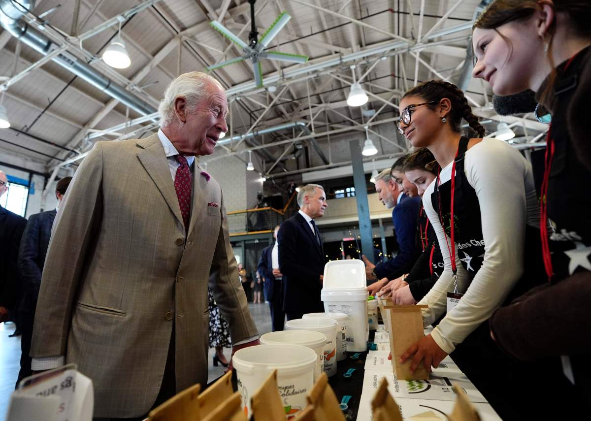 King Charles meets members of La Tablee des chefs, at a community gathering at Lansdowne Park in Ottawa during a royal visit, on Monday, May 26, 2025. THE CANADIAN PRESS/Justin Tang