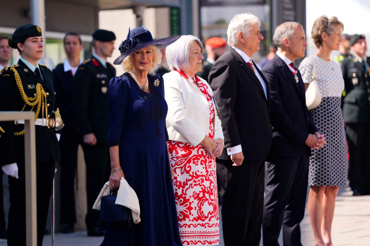 Queen Camilla looks on, during an inspection of the guard at the Senate of Canada Building in Ottawa during a royal visit on Tuesday, May 27, 2025. THE CANADIAN PRESS/Justin Tang