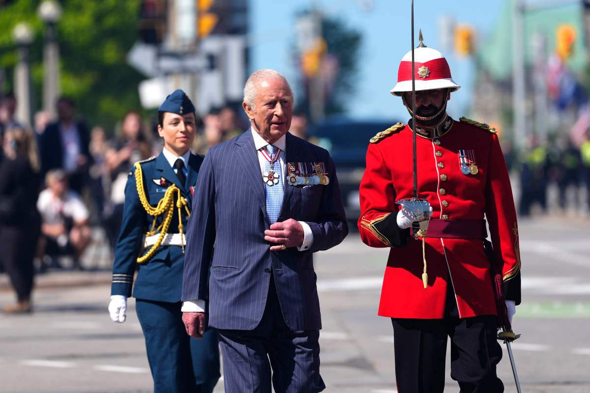 King Charles inspects an honour guard at the Senate of Canada Building in Ottawa during a royal visit, on Tuesday, May 27, 2025. THE CANADIAN PRESS/Justin Tang