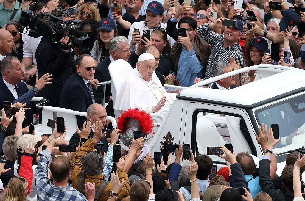 Pope Francis on the Popemobile tours the square at the end of the Holy Mass on Easter Sunday and "Urbi et Orbi" Blessing at Saint Peter's Square.