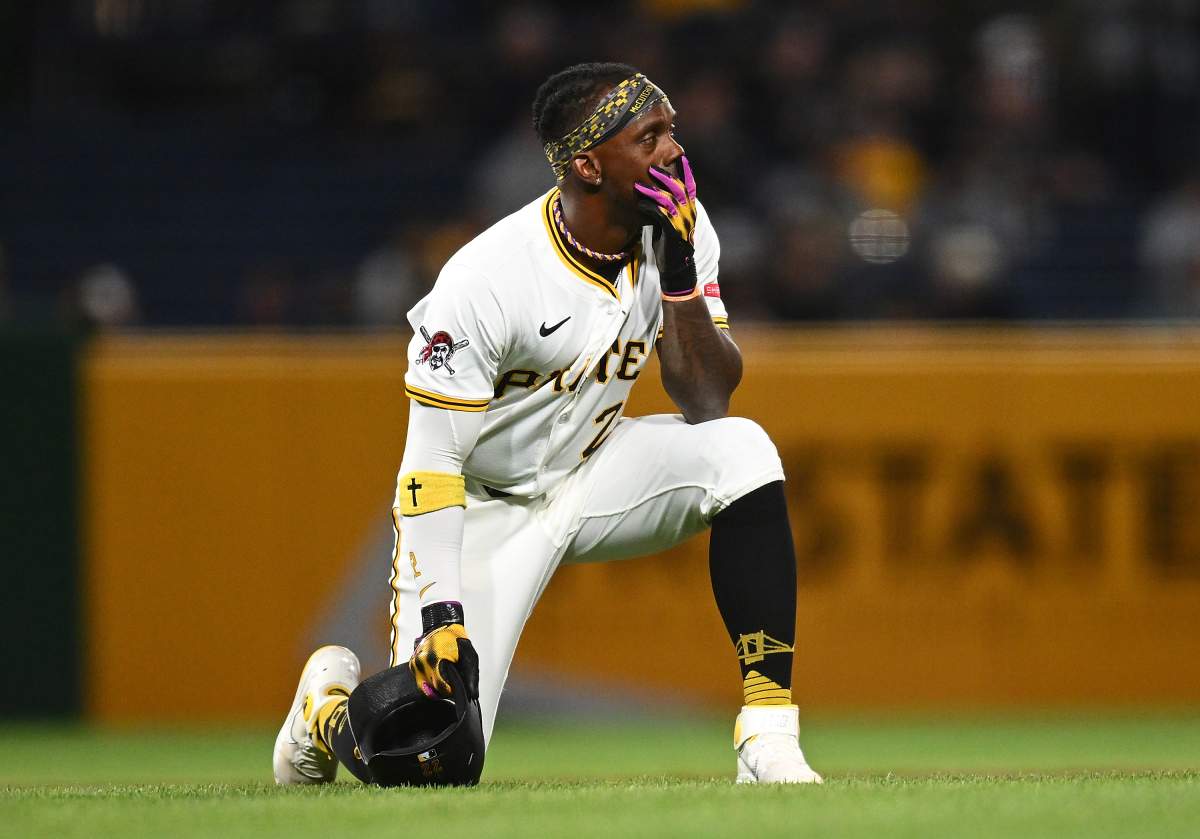 Andrew McCutchen of the Pittsburgh Pirates looks on after a fan fell from the stands during the seventh inning against the Chicago Cubs at PNC Park on April 30, 2025 in Pittsburgh.