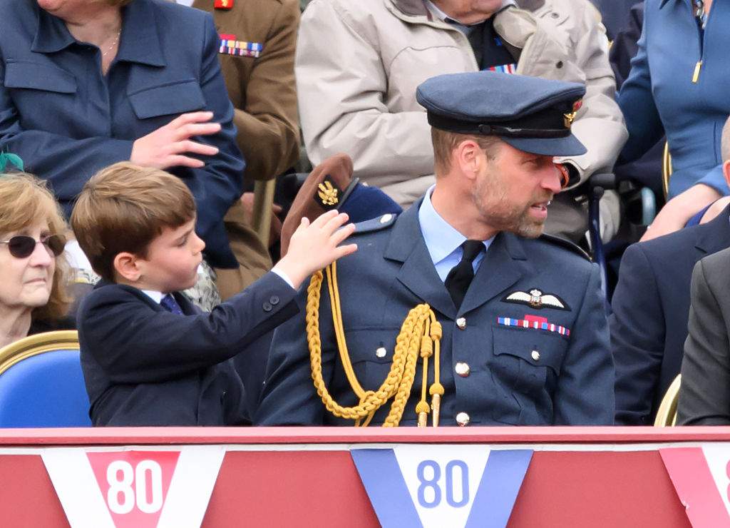 Prince Louis of Wales and Prince William, Prince of Wales during the military procession to mark the 80th anniversary of VE Day on May 5, 2025 in London, England.