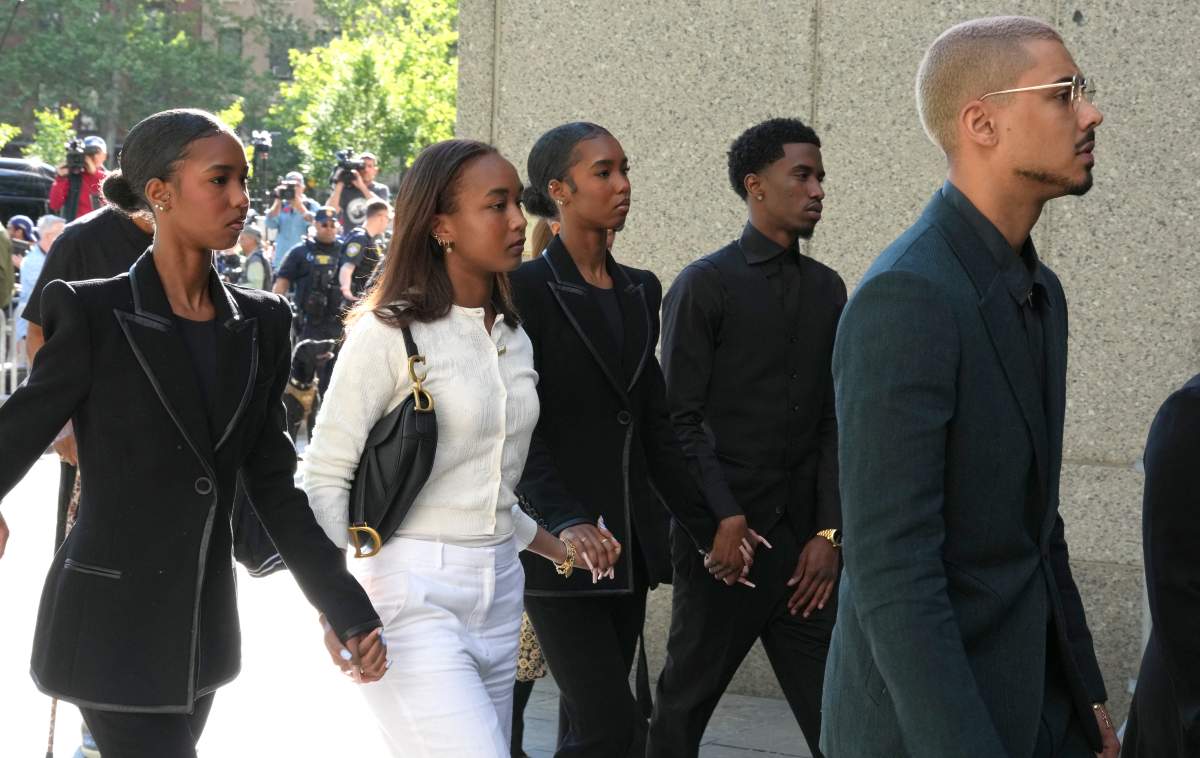 Quincy Brown (R), stepson of Sean Combs, and King Combs (2nd R), son of Sean Combs, arrive at federal court for the sex trafficking trial of Sean "Diddy" Combs in New York City on May 12, 2025.