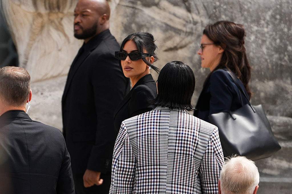Kim Kardashian arrives at the Palais de Justice, Alaia sunglasses, on May 13, 2025 in Paris, France.