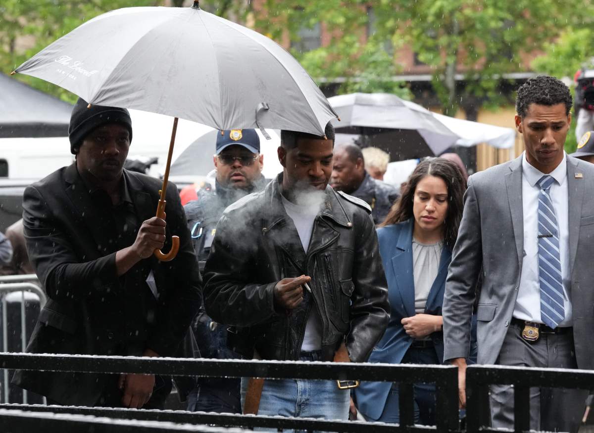 Rapper Kid Cudi (C) arrives at federal court for the Sean 'Diddy' Combs sex trafficking trial in New York City on May 22, 2025.
