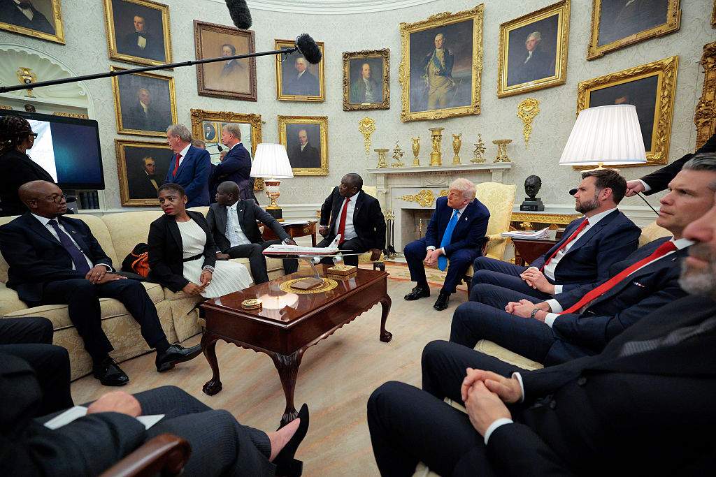 President of South Africa Cyril Ramaphosa (C-L) and U.S. President Donald Trump (C-R) look on as a video plays in the Oval Office of the White House on May 21, 2025 in Washington, DC.