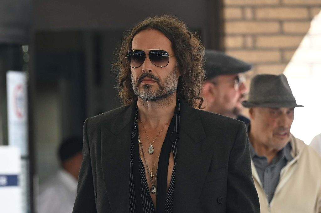 Actor-comedian Russell Brand arrives at Southwark Crown Court for a hearing on charges of rape, indecent assault, and two counts of sexual assault involving four women in London, United Kingdom on May 30, 2025. The alleged offenses occurred between 1999 and 2005 in Bournemouth and Westminster.