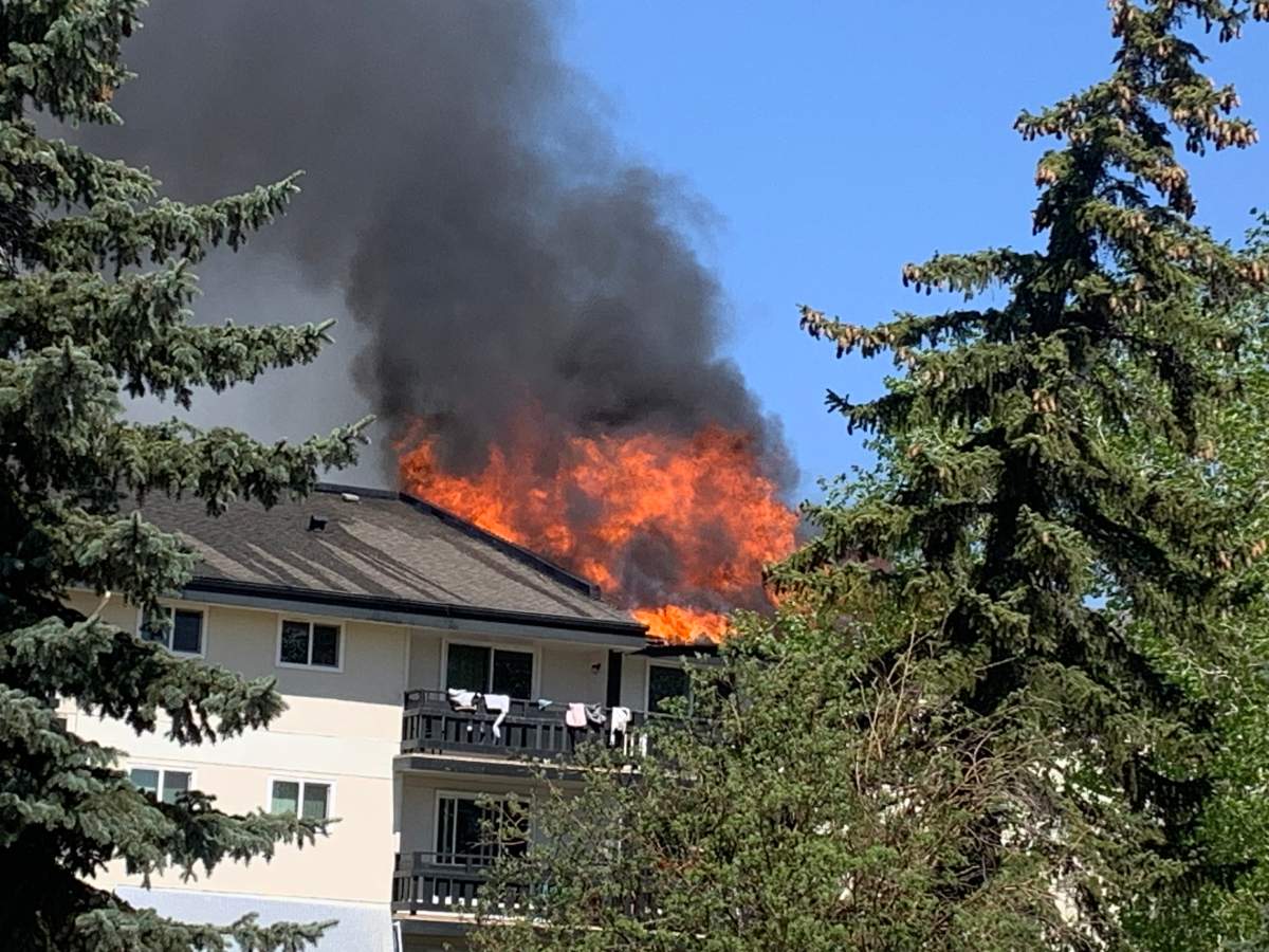 An apartment fire in the Wyndham Crossing complex at 4908 134 Ave. in northeast Edmonton on Tuesday, May 6, 2025.
