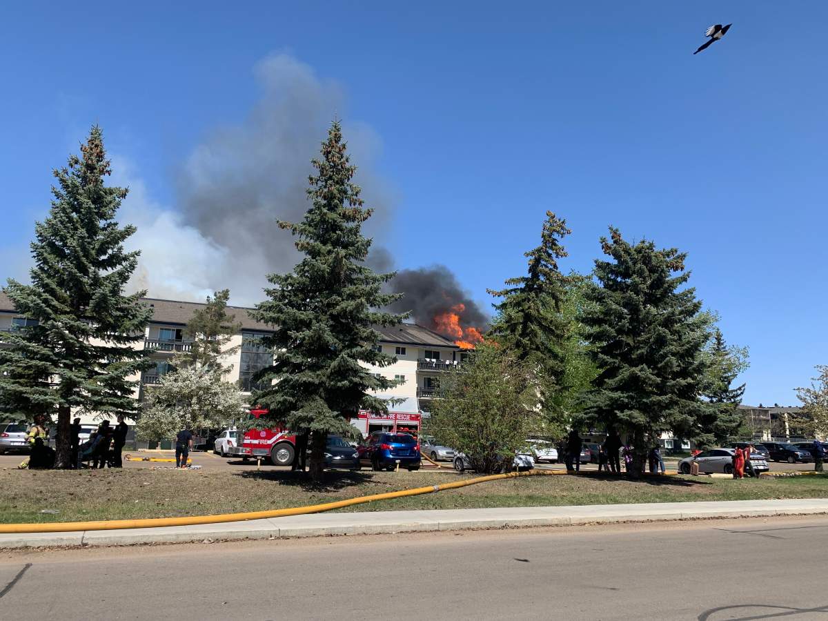 An apartment fire in the Wyndham Crossing complex at 4908 134 Ave. in northeast Edmonton on Tuesday, May 6, 2025.
