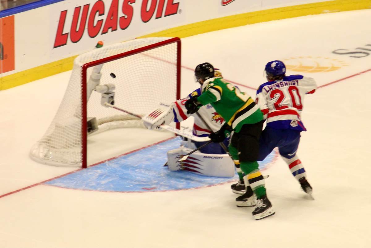 Sam O'Reilly deflects in the game winning goal in overtime on Day 2 of the 2025 Memorial Cup tournament to give the London Knights a 3-2 win over the Moncton Wildcats.