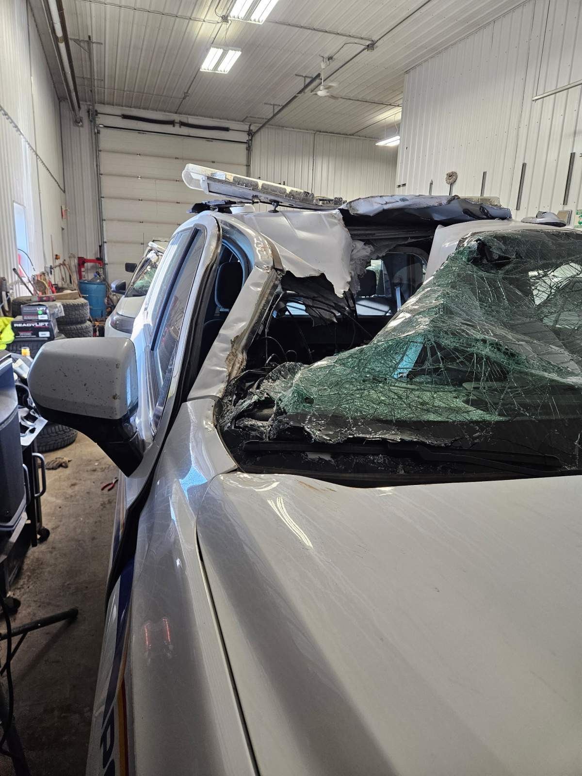 A stolen trackhoe (excavator) destroyed five cruisers at the Bonnyville RCMP detachment on Saturday, May 3, 2025.