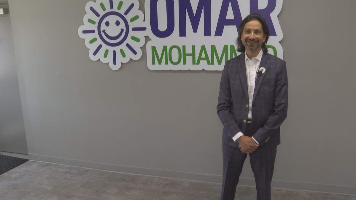 Edmonton mayoral candidate Omar Mohammad stands in his campaign office on May 25, 2025.