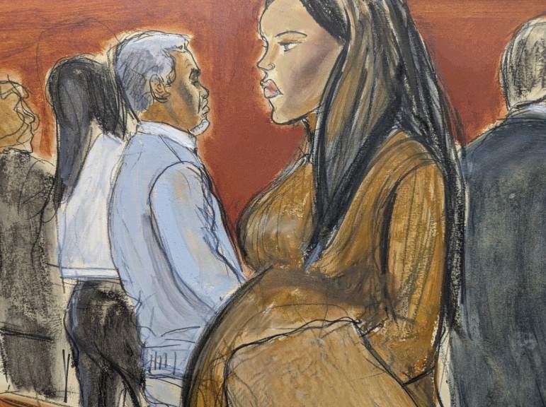 Cassie Ventura, right, walks out of the courtroom past Sean 'Diddy' Combs after testifying in Manhattan federal court, Tuesday, May 13, 2025, in New York.