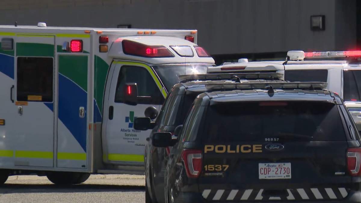 Calgary police could be seen outside Bishop McNally high school on Wednesday morning, following reports a student was attacked by someone with an airsoft gun.