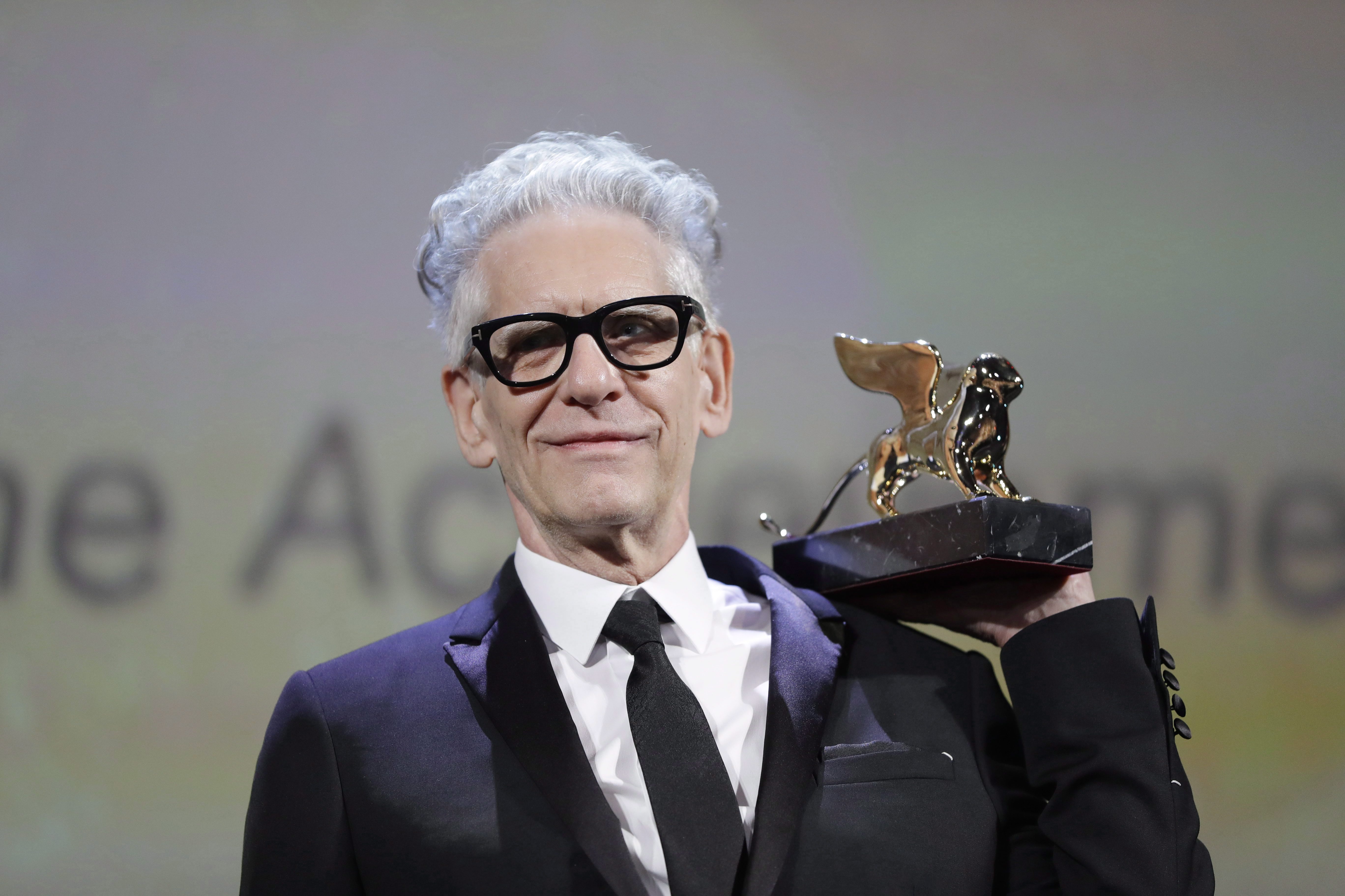 Director David Cronenberg holds his Golden Lion for Lifetime Achievement award at the 75th edition of the Venice Film Festival in Venice, Italy, Thursday, Sept. 6, 2018.