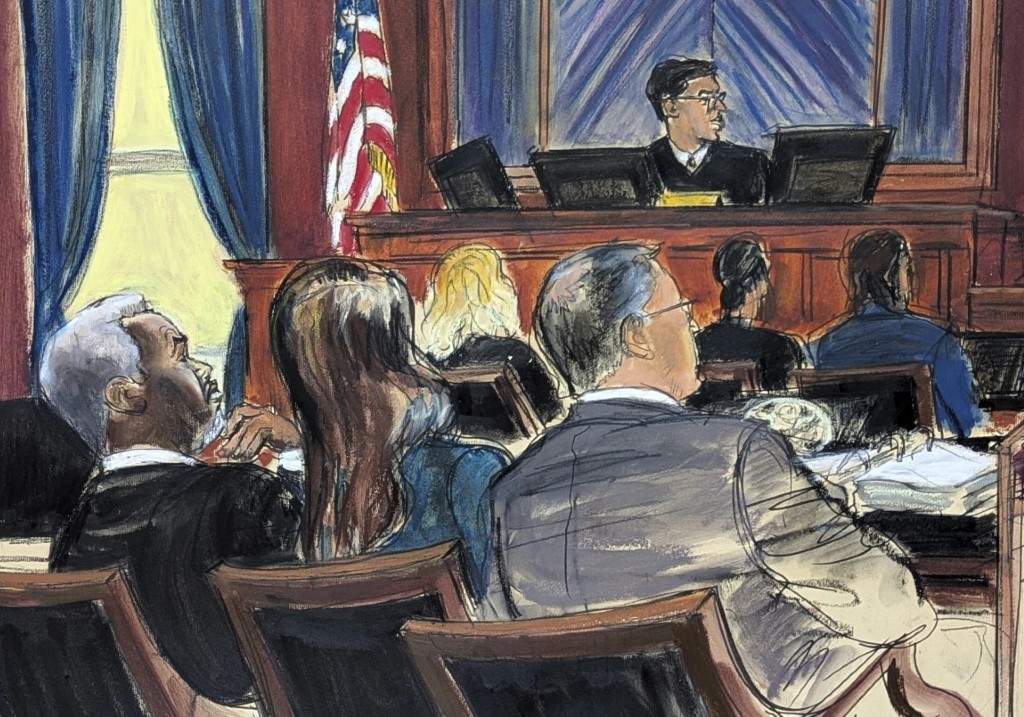 Sean 'Diddy' Combs, far left, looks on from the defence table with his lawyers, as a prospective juror, far right, answers questions posed by Judge Arun Subramanian, centre, at Manhattan federal court, Monday, May 5, 2025.
