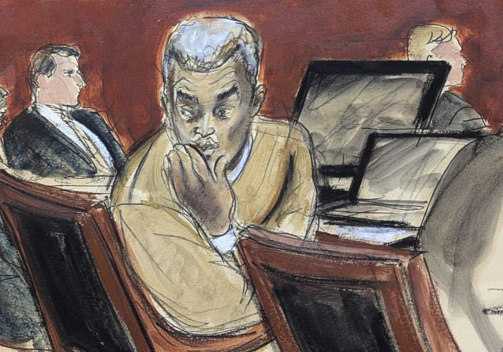 Sean 'Diddy' Combs, right, blows kisses to people in the audience during his sex trafficking and racketeering trial in Manhattan federal court, Monday, May 19, 2025, in New York.