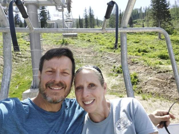 This June 4, 20233, photo shows Kell Morris, left, and his wife Jo Roop, in Sandpoint, Idaho.