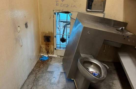 Prisoners at the Orleans Parish jail escaped through in the wall behind a toilet.