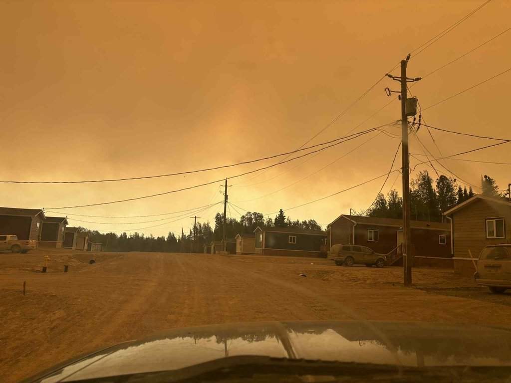Smoke from wildfires is shown at Sandy Lake First Nation, Ontario.