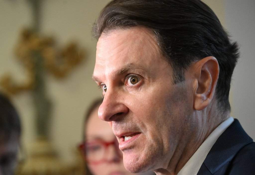 Quebec Public Security Minister Francois Bonnardel responds to reporters questions at the legislature in Quebec City, Tuesday, Feb. 18, 2025. 